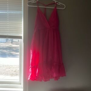 Pink dress with side zipper, front button and open back